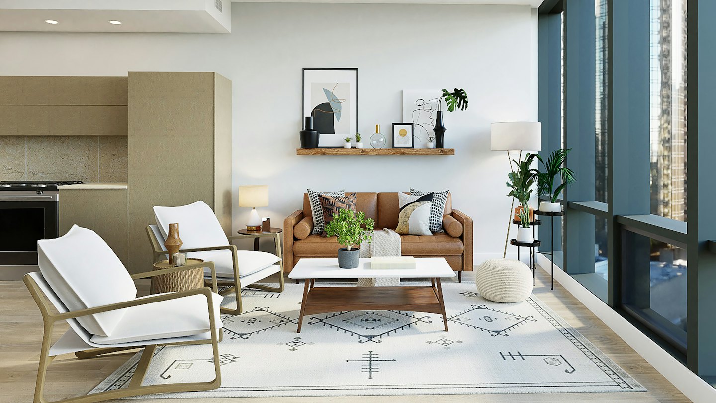 Modernes Wohnzimmer mit Ledersofa und Stadtblick.